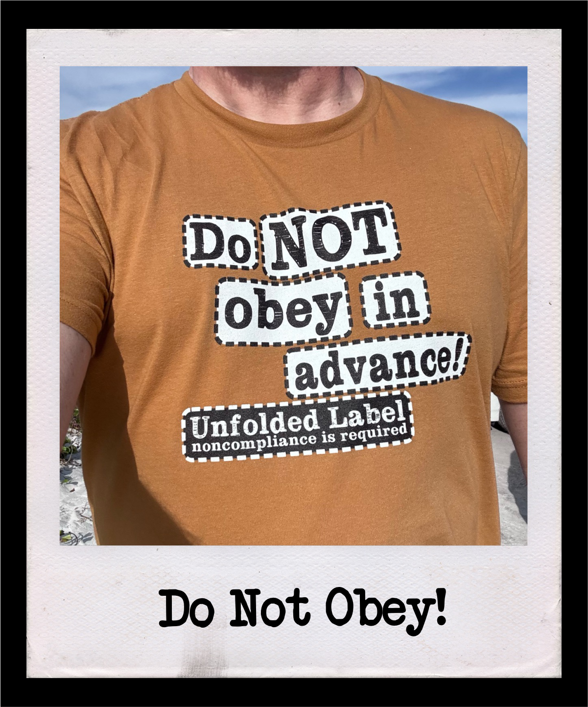 Do Not Obey In Advance resistance t-shirt by Unfolded Label. Anti-authoritarian protest tee for activists and freethinkers. Artist-designed graphic tee in multiple colors.