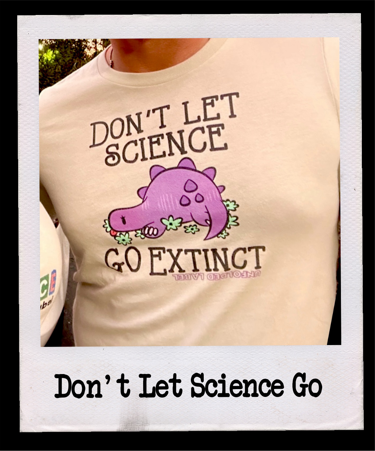 Don’t Let Science Go Extinct pro-science protest t-shirt by Unfolded Label. Bold resistance clothing for science advocates and critical thinkers. Available in multiple colors.