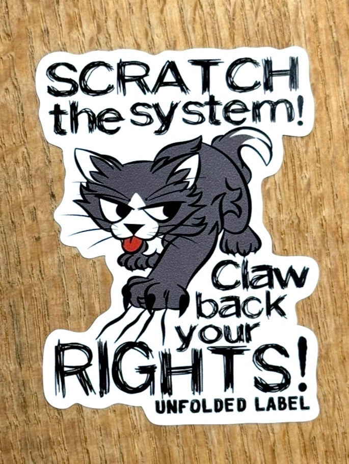 Protests sticker with a cat graphic and text on a wooden surface by Unfolded Label
